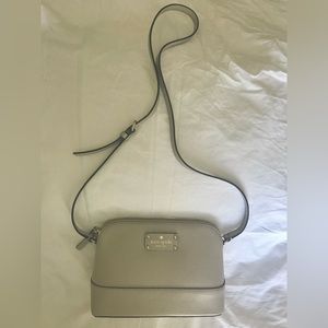 Kate Space Taupe Domed Cross Body Bag with dust bag included.